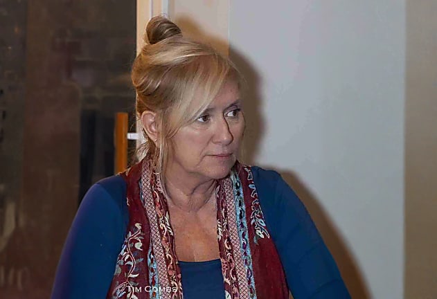 Kim E.